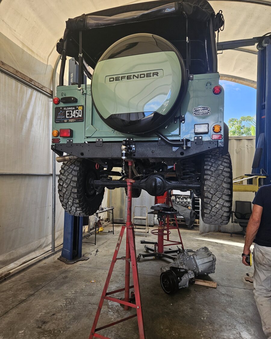 The same SCÖGAN Defender 110 on the lift during its frame-off build